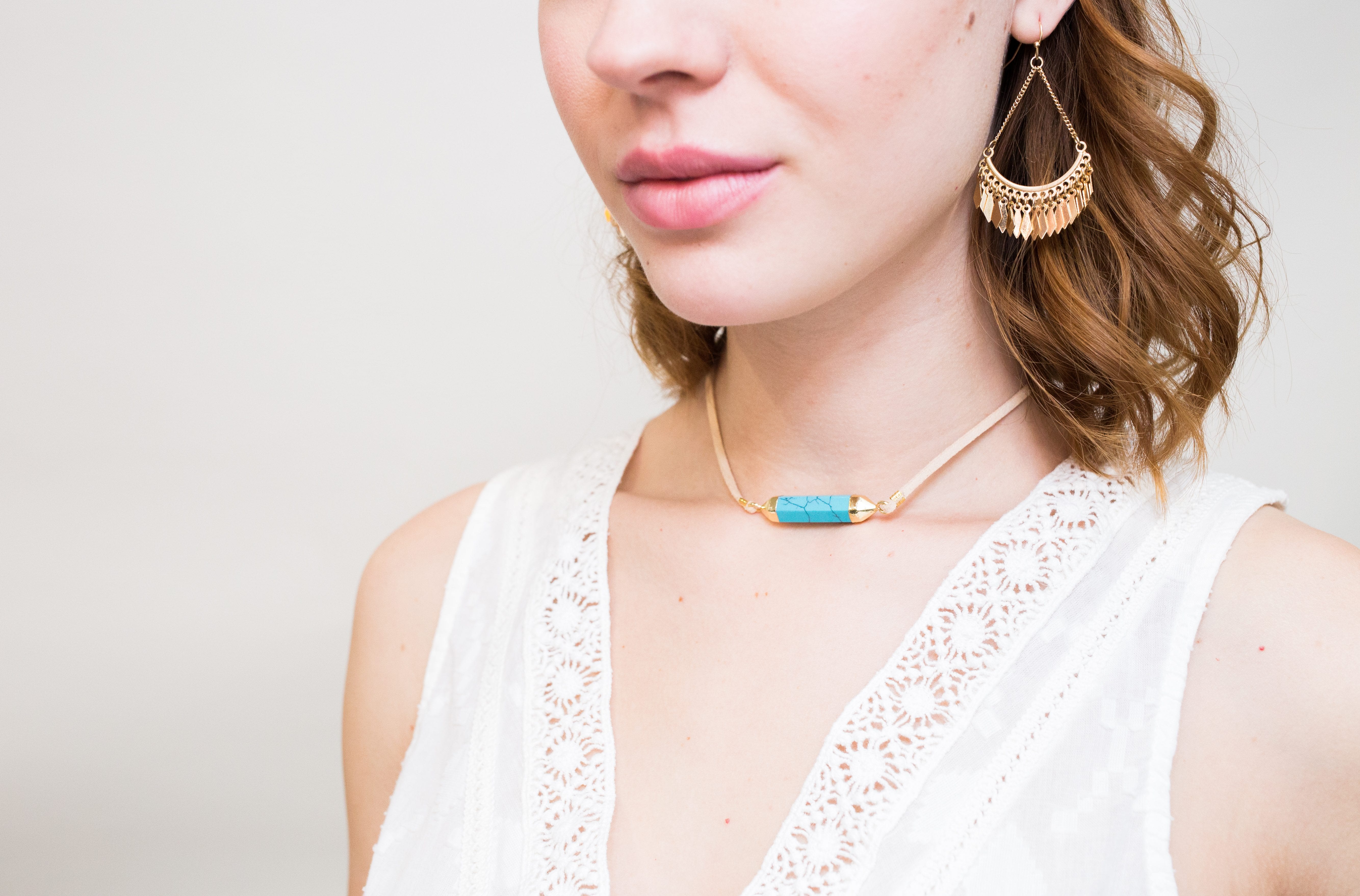 close up of turquoise stone choker necklace
