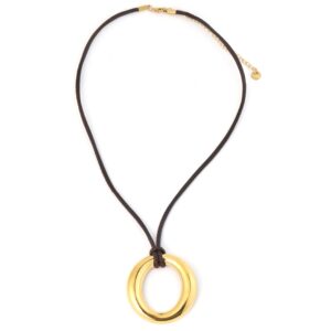 Modern black cord pendant necklace featuring gold-plated brass accents. A versatile statement necklace inspired by effortless coastal style.