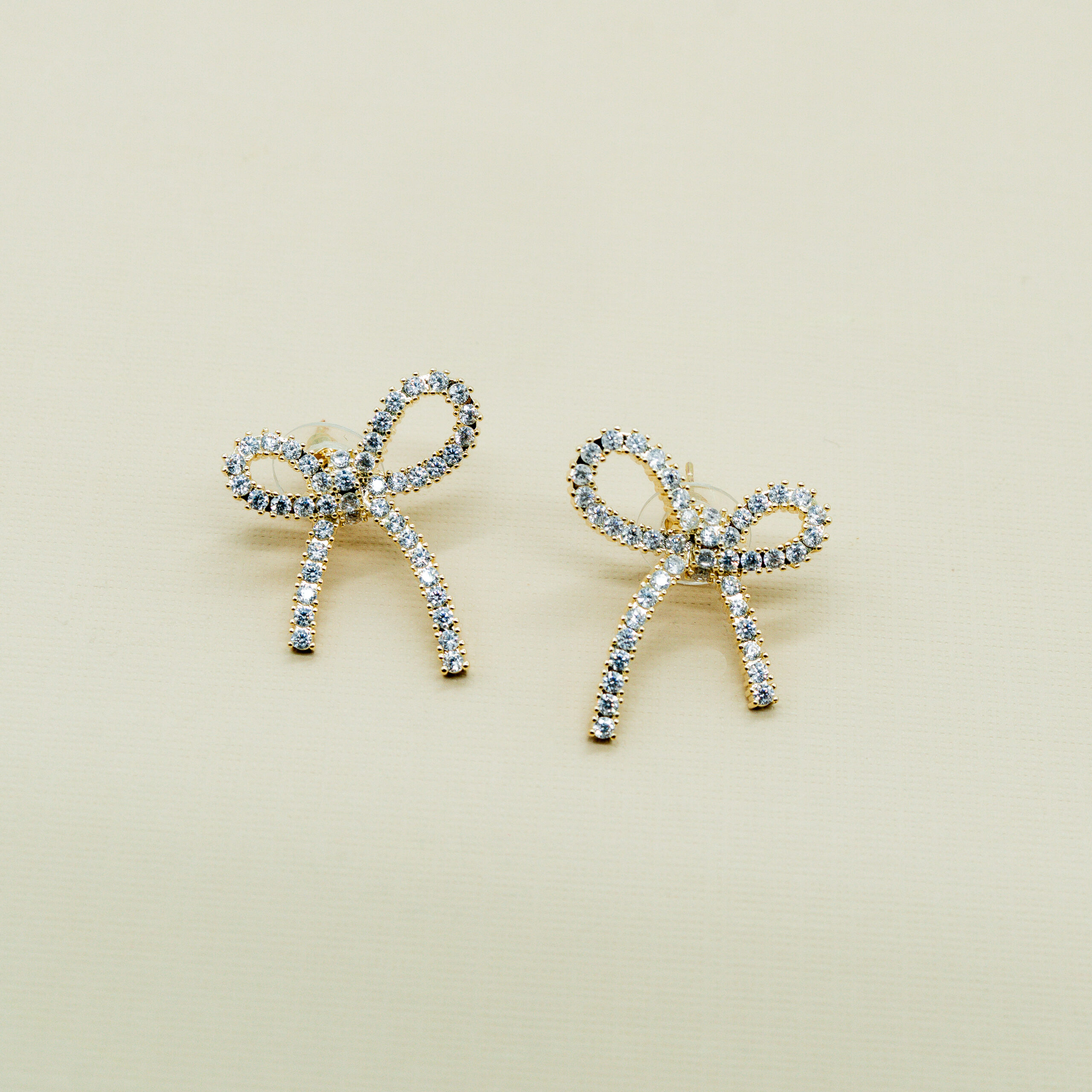 GOLD-PLATED CRYSTAL BOW STUD EARRINGS - Image 2